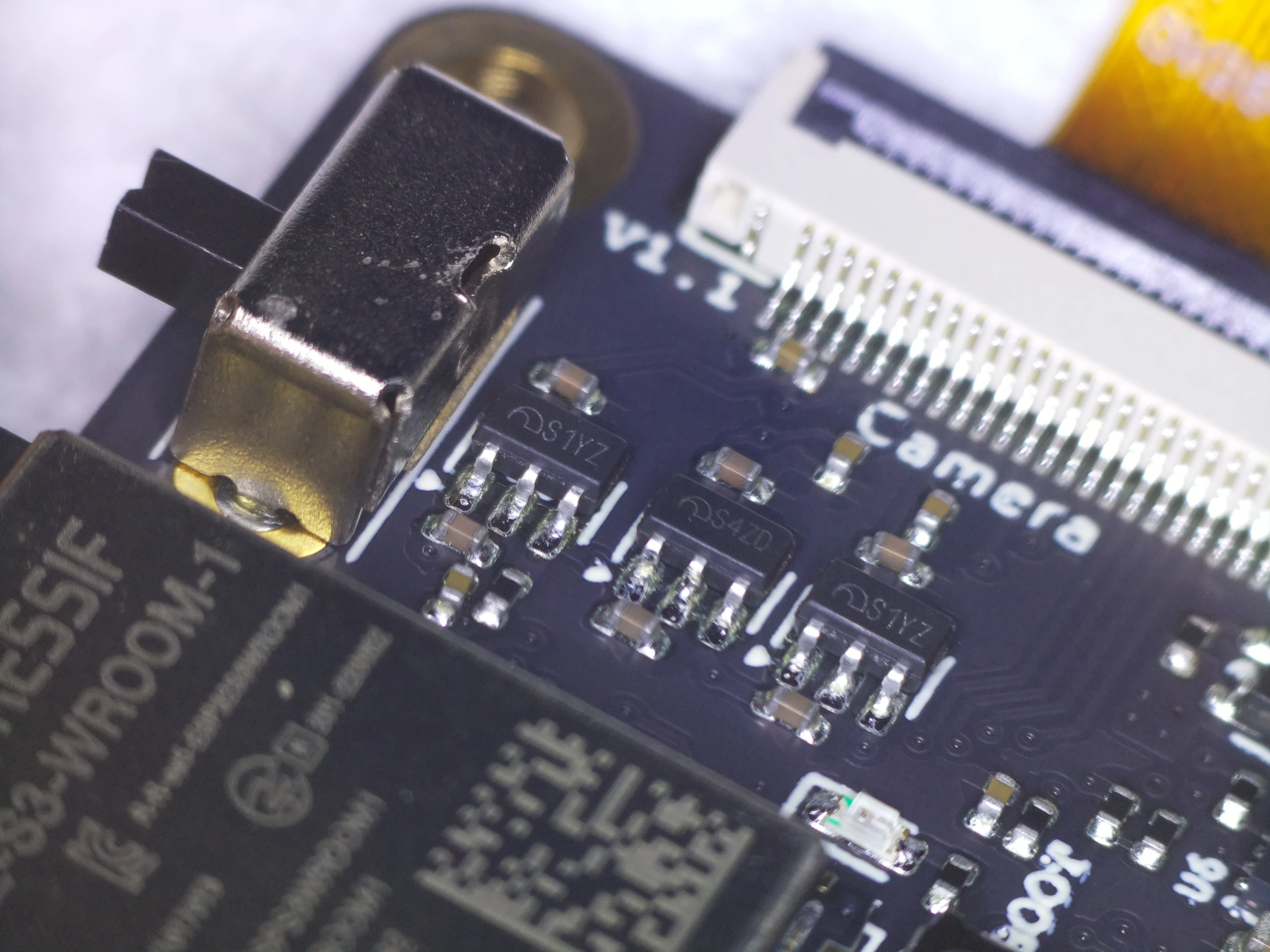 3x SOT-23-5 LDOs behind the camera connector